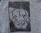 Dog block print baby onesie close up