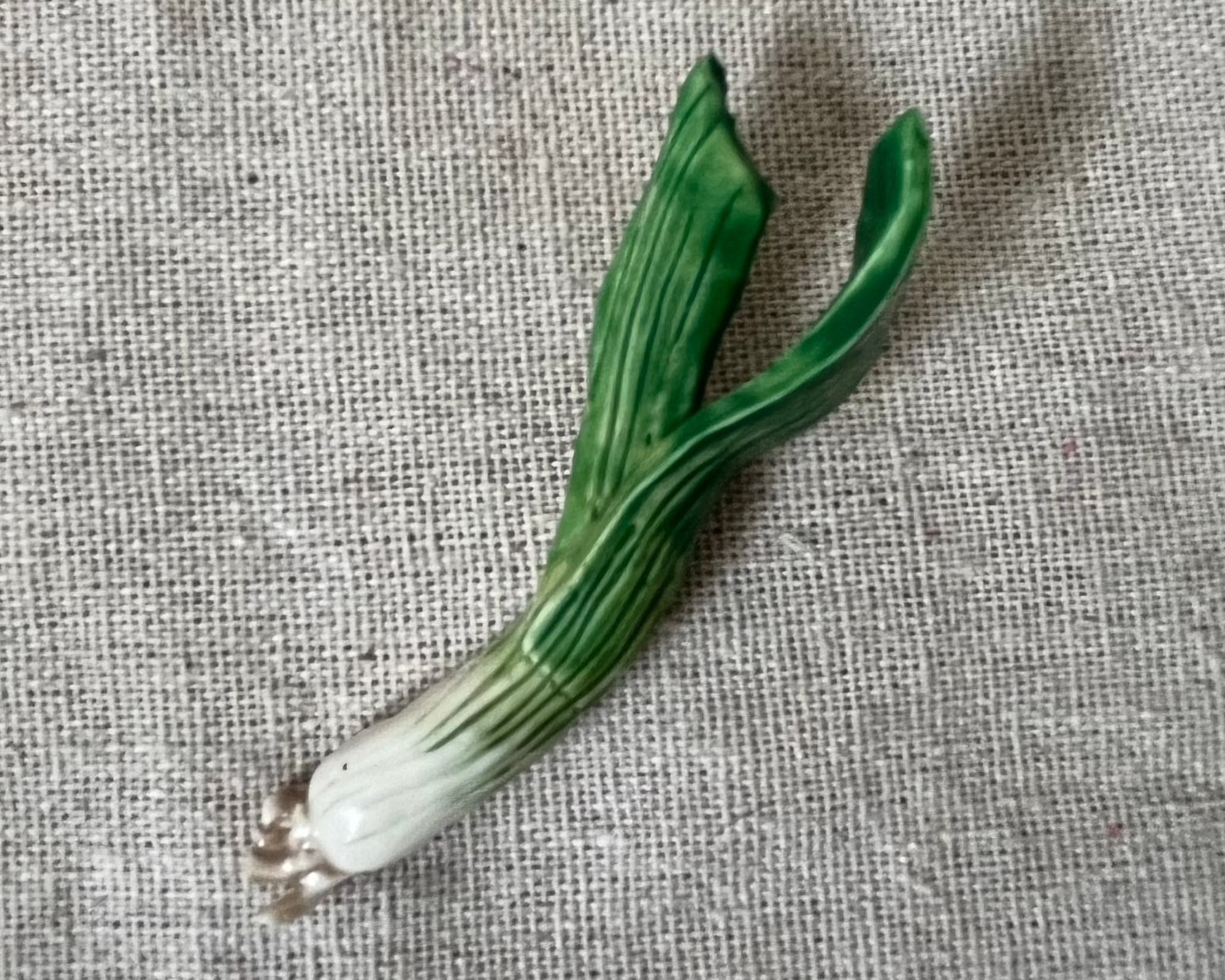 Handmade green onion polymer clay brooch pi close up