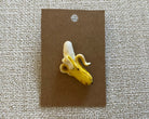 Banana handmade polymer clay brooch pin paper background