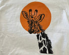 Hand printed giraffe and sun block print toddler t-shirt close up