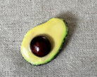 Avocado handmade polymer clay brooch pin close up