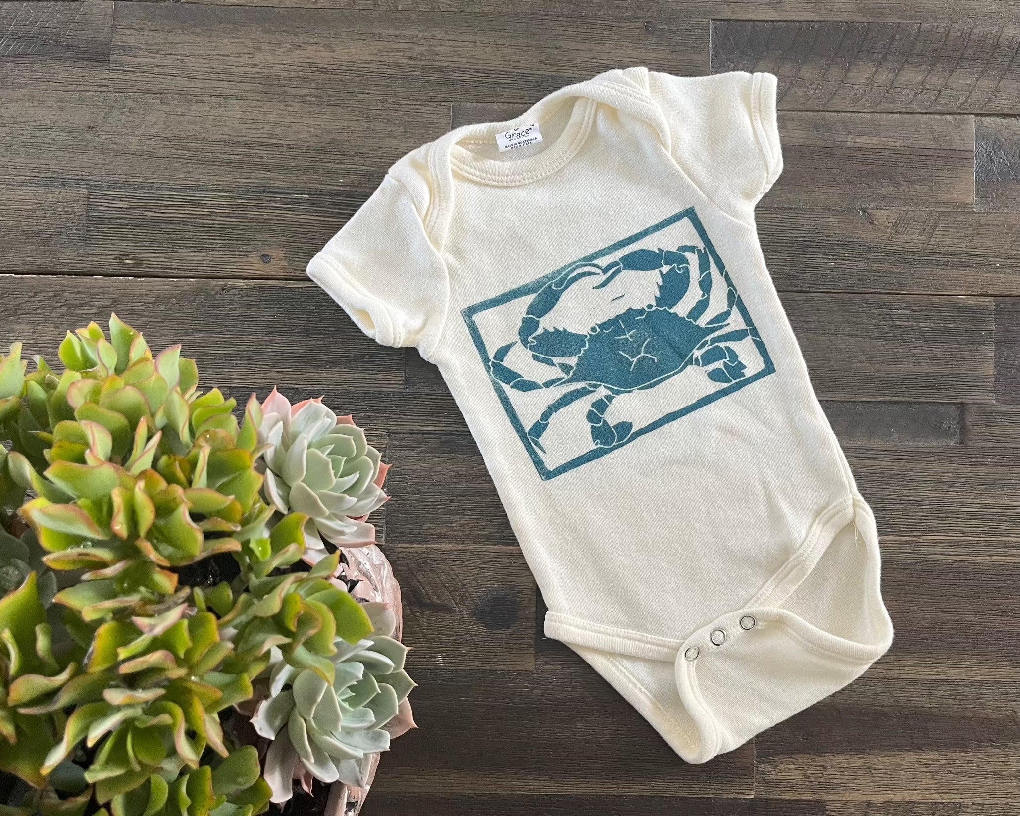 Crab block print baby onesie