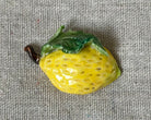 Handmade lemon polymer clay brooch pin close up